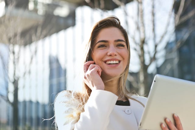 A client who is a woman laughing